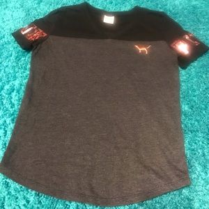 Gray black and rose gold/ pink brand shirt